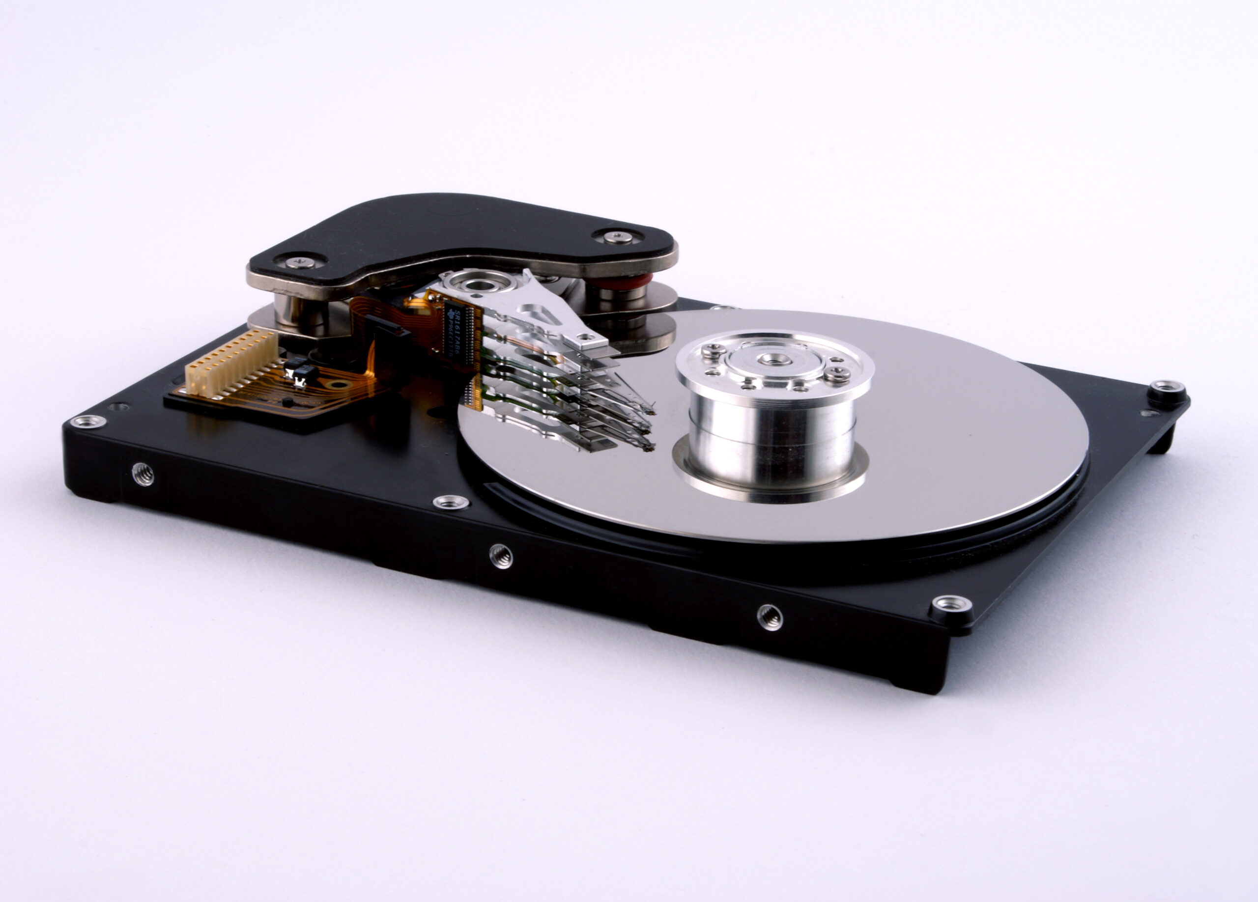 image of an open Hard disk drive showing a hard drive repair for data recovery